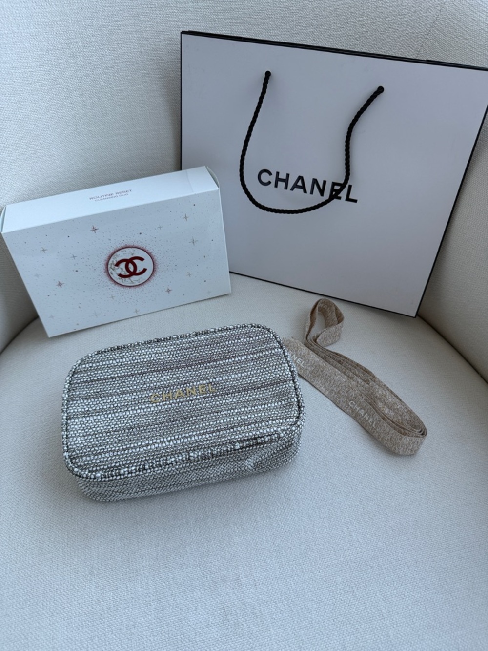 CHANEL Silver Sparkle Quilted Cosmetic Case with Gold Logo
